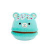 Squishmallows Belinda, Ursul Macaron Albastru cu Umplutură de Ciocolată și Bombonele Roz, 20 cm